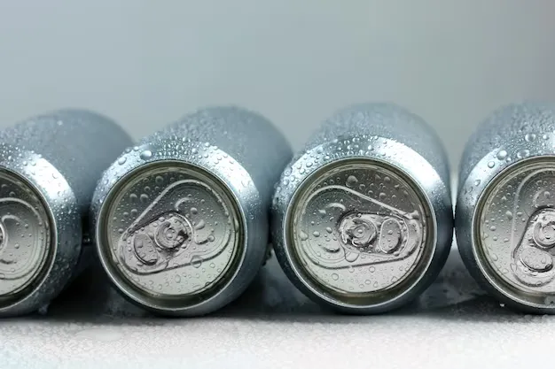 four metal cans placed horizontally with each other.