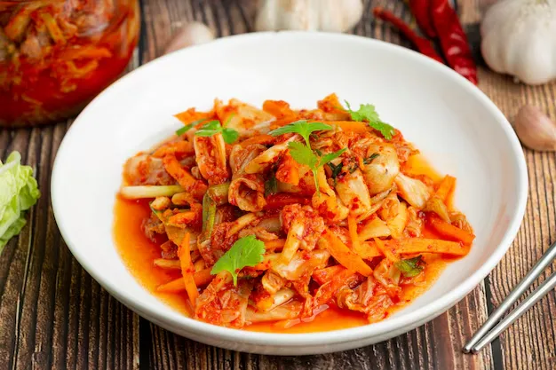 ready-to-eat kimchi in a white bowl