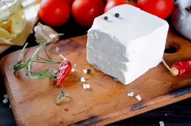 feta cheese on the wooden board